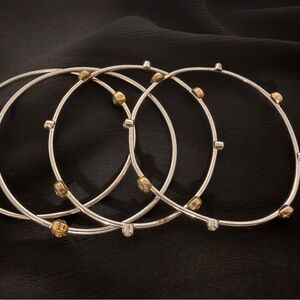 Henri Bendel Silver Bangle Bracelet Set of Four with Gold Accents
